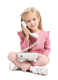 Photo of Cute little girl with telephone on white background