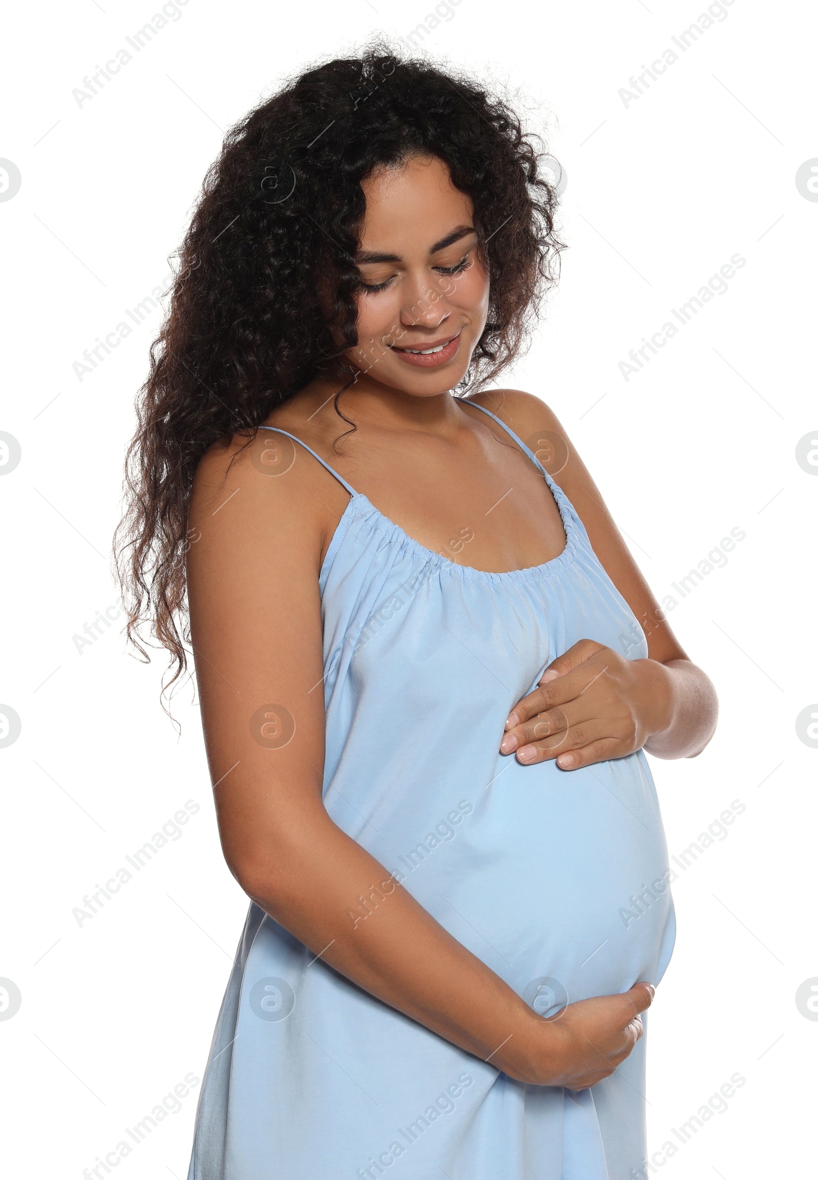 Photo of Portrait of beautiful pregnant woman on white background