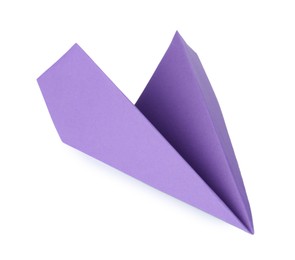 Photo of One handmade purple paper plane isolated on white