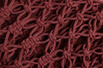 Photo of Macrame shopping bag as background, top view