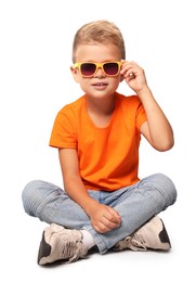 Photo of Little boy with sunglasses on light grey background