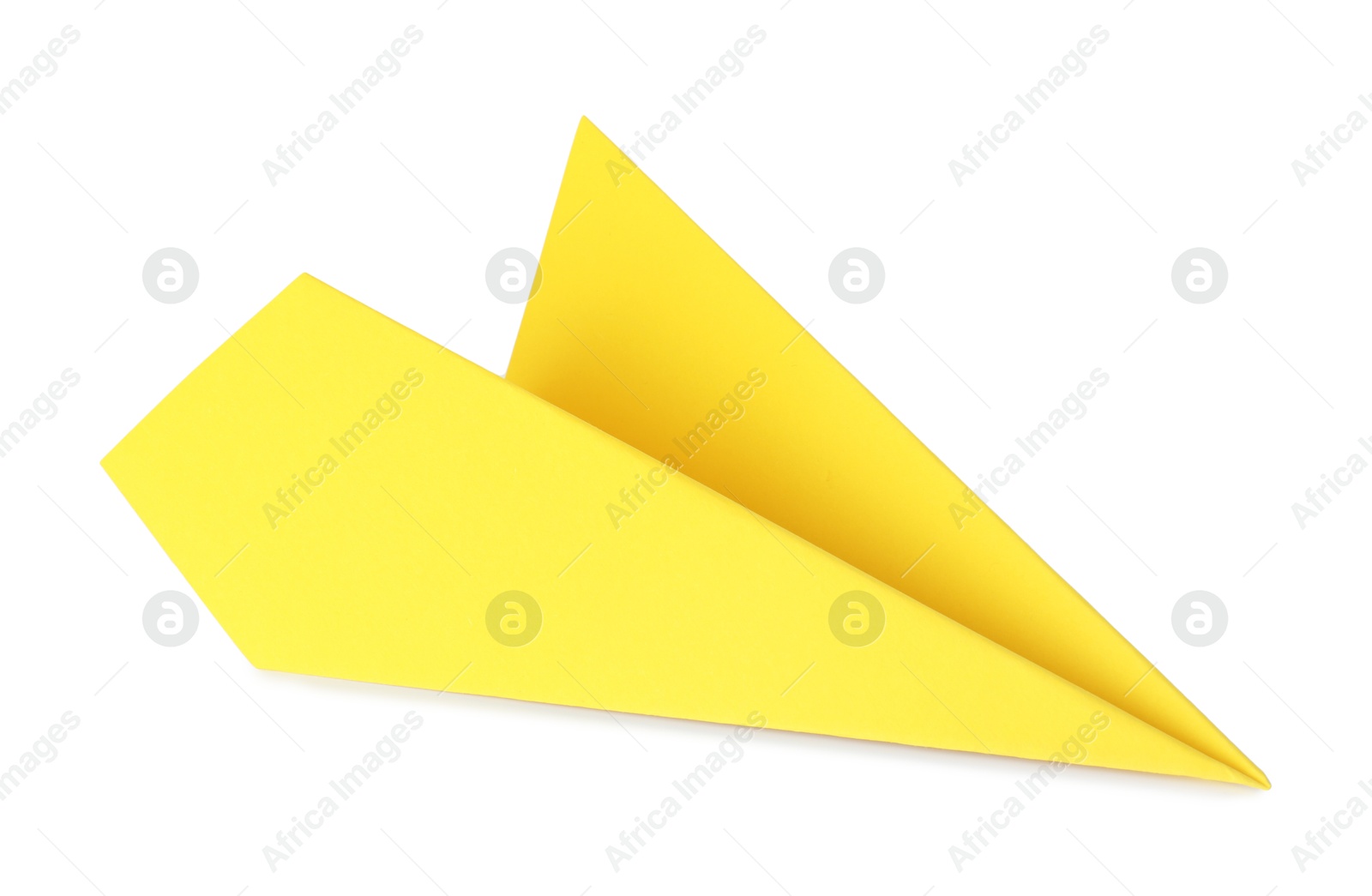 Photo of One handmade yellow paper plane isolated on white