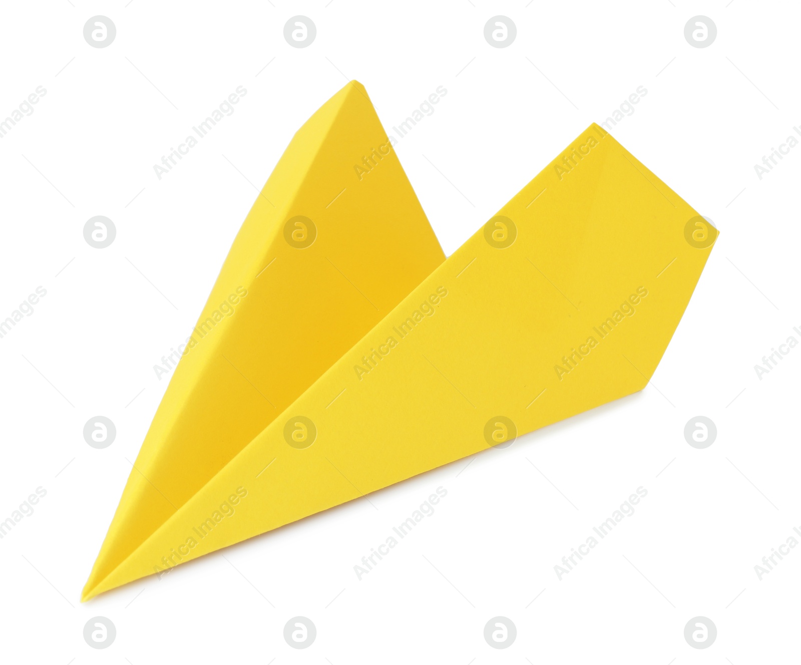 Photo of One handmade yellow paper plane isolated on white