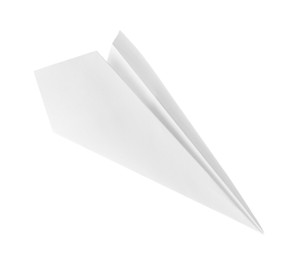 Photo of One handmade paper plane isolated on white