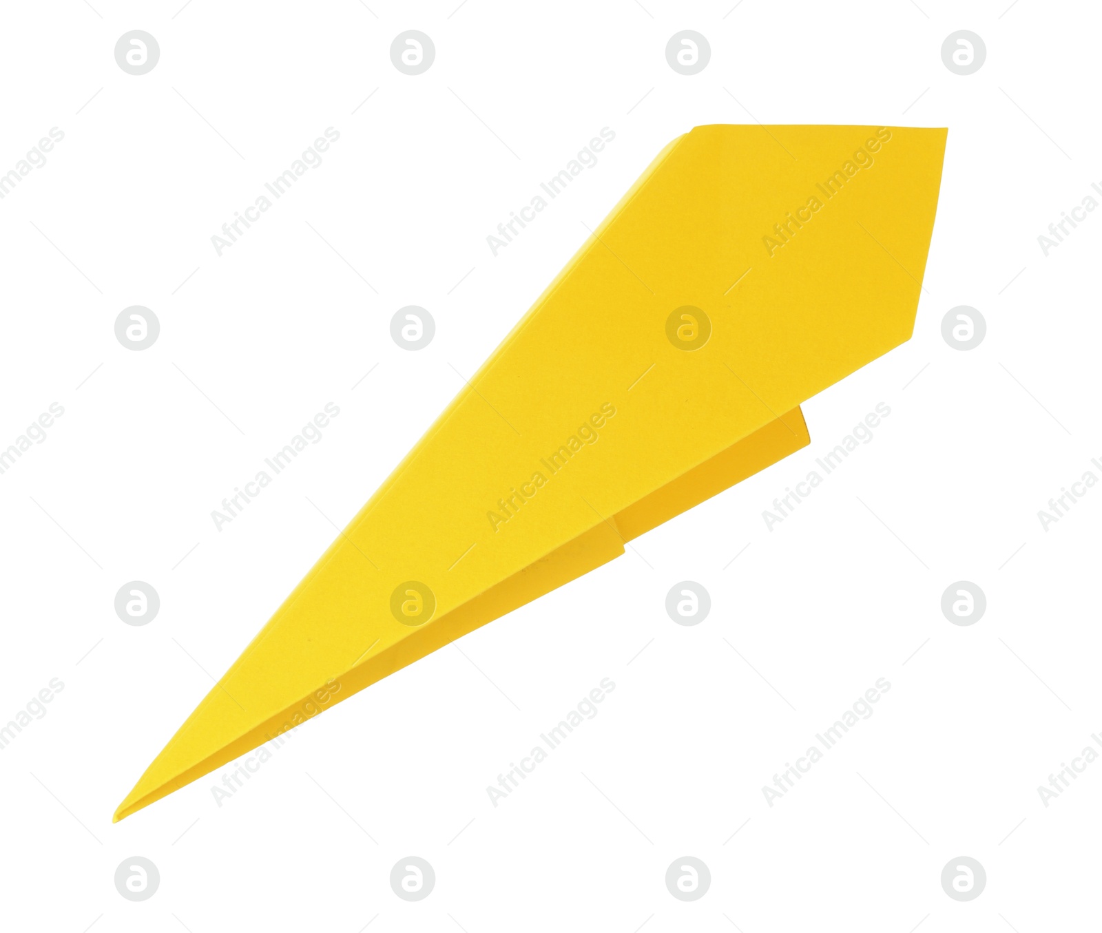 Photo of One handmade yellow paper plane isolated on white