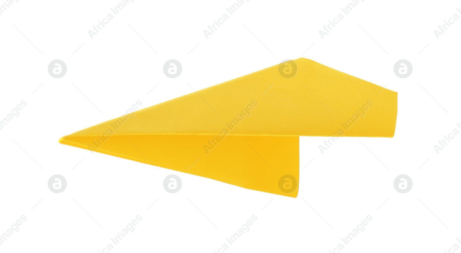 Photo of One handmade yellow paper plane isolated on white