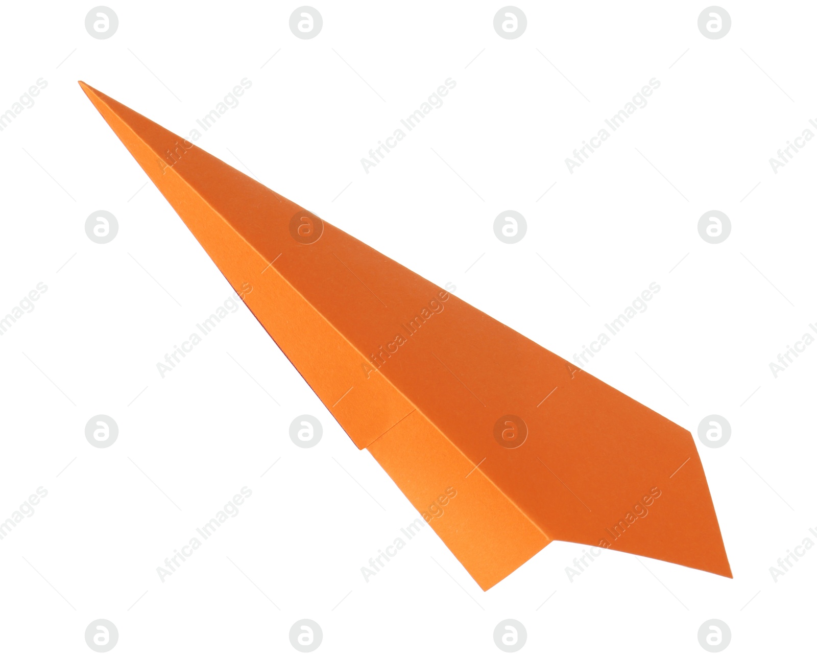 Photo of One handmade orange paper plane isolated on white