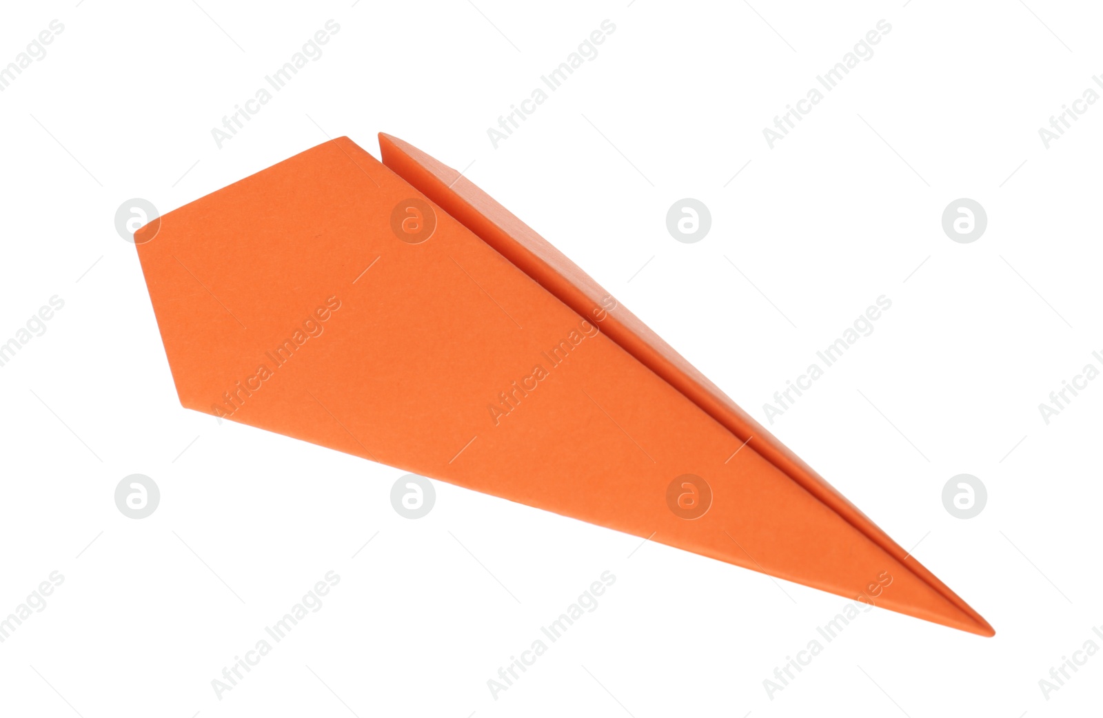 Photo of One handmade orange paper plane isolated on white