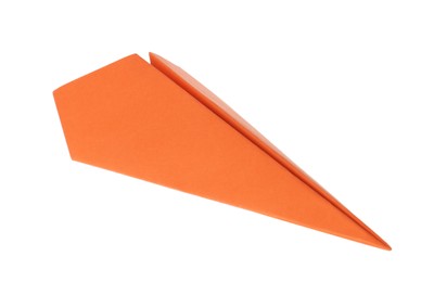 Photo of One handmade orange paper plane isolated on white