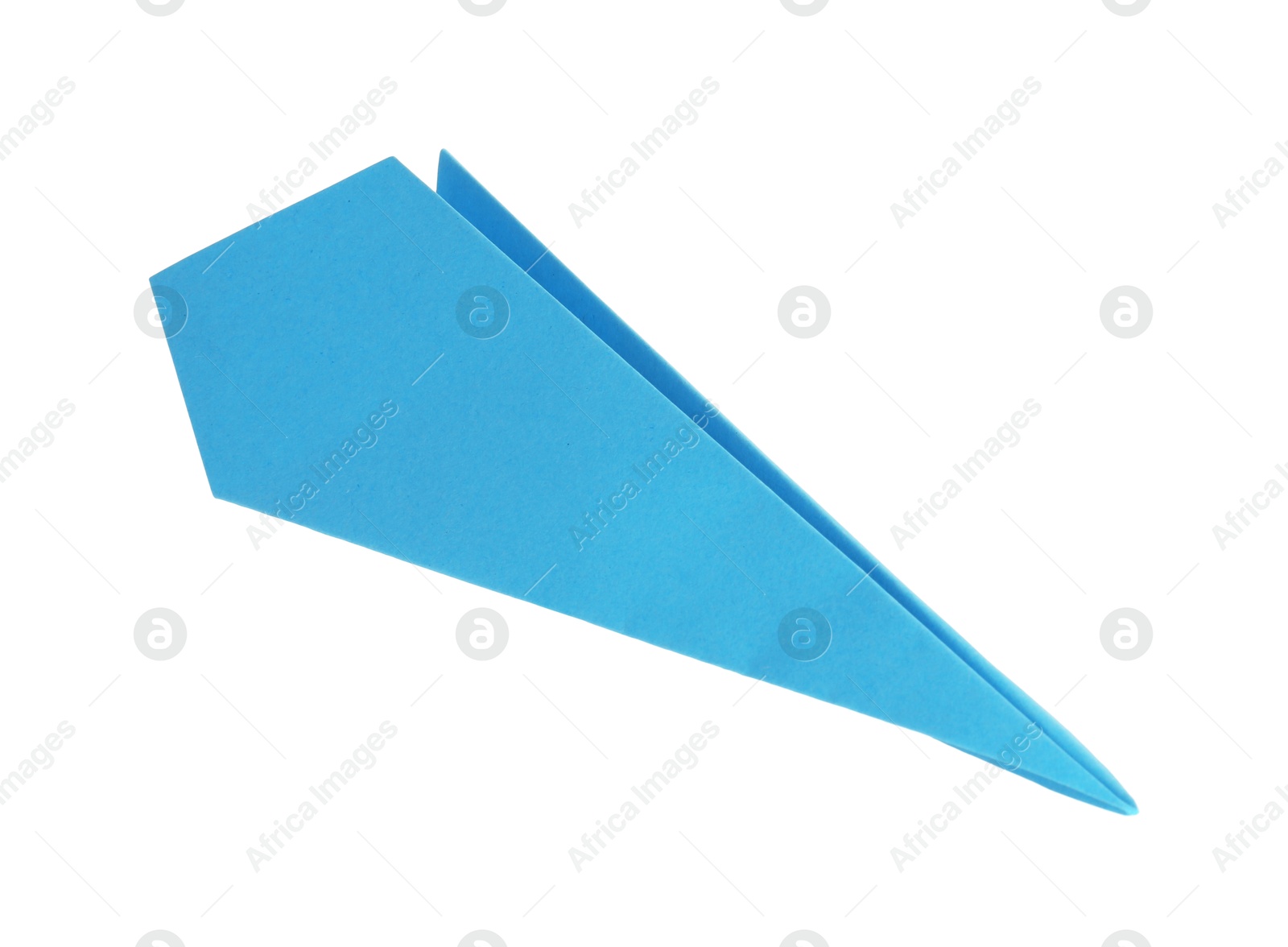 Photo of One handmade light blue paper plane isolated on white