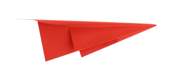 Photo of One handmade coral paper plane isolated on white