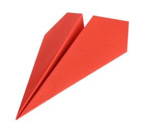 Photo of One handmade coral paper plane isolated on white