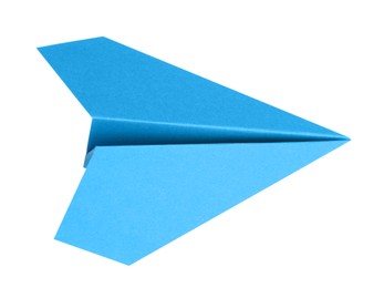 Photo of One handmade light blue paper plane isolated on white