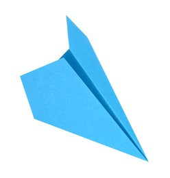 Photo of One handmade light blue paper plane isolated on white