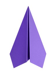 Photo of One handmade purple paper plane isolated on white