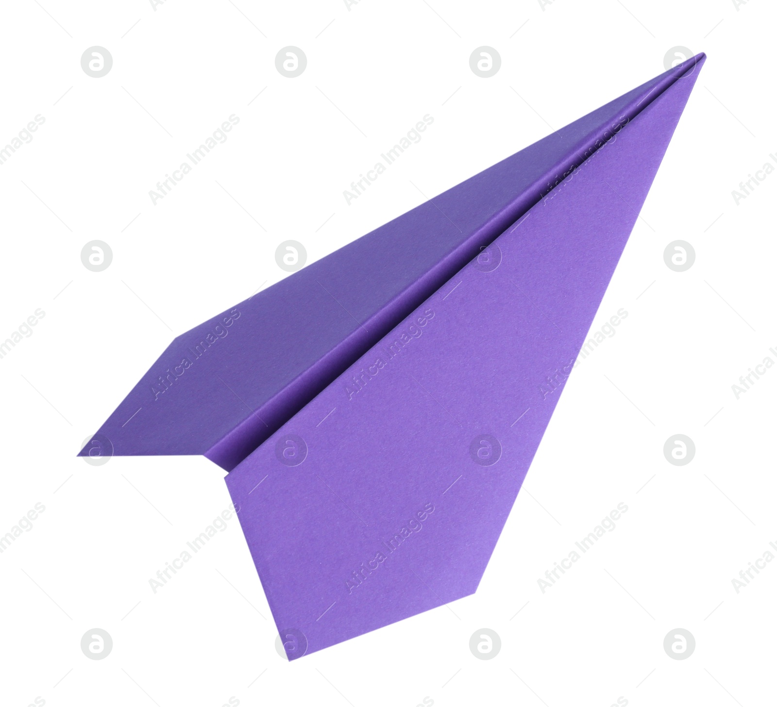 Photo of One handmade purple paper plane isolated on white