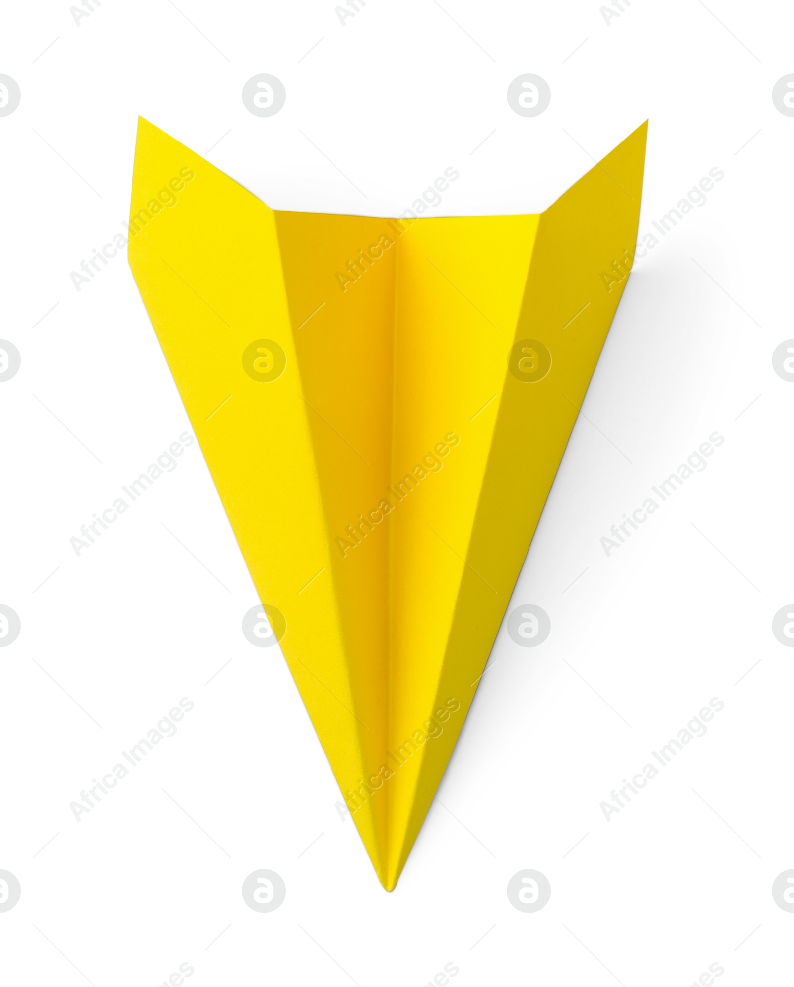 Photo of One handmade yellow paper plane isolated on white, top view