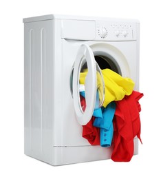 Photo of Washing machine full of colorful clothes isolated on white