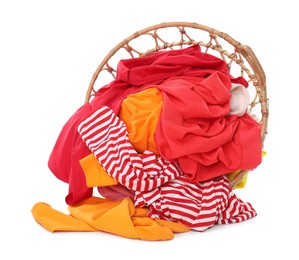 Photo of Laundry basket with colorful clothes isolated on white