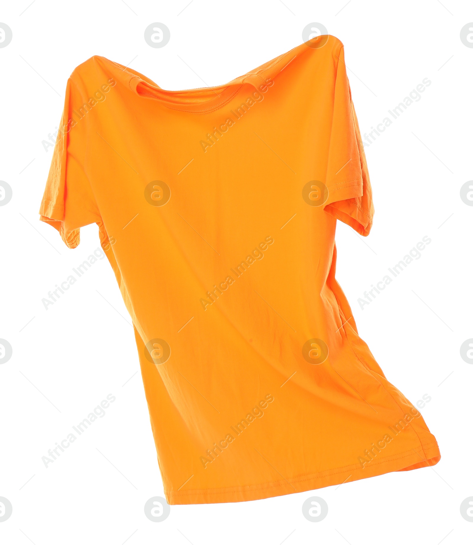 Photo of One orange t-shirt in air isolated on white