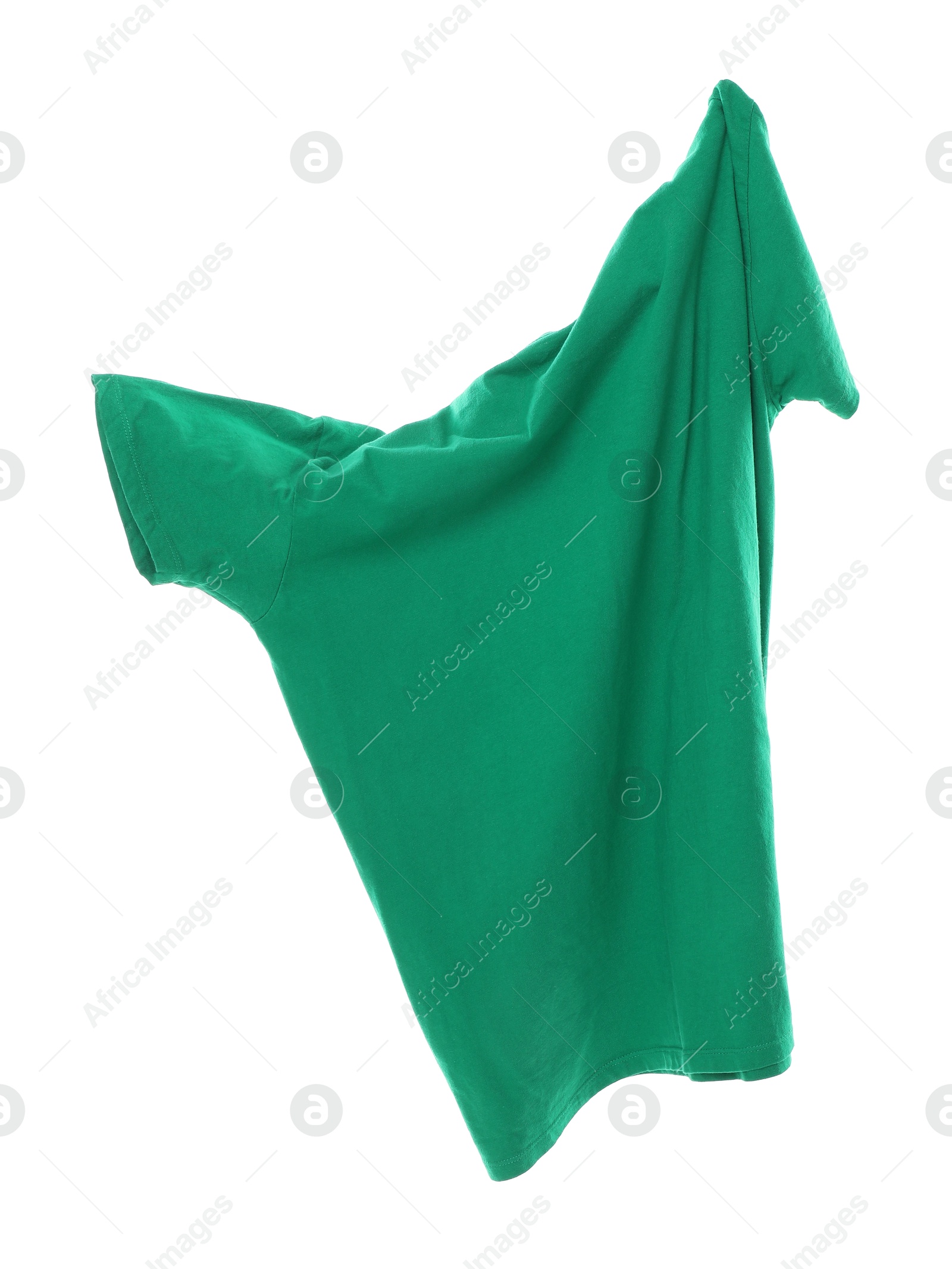 Photo of One green t-shirt in air isolated on white