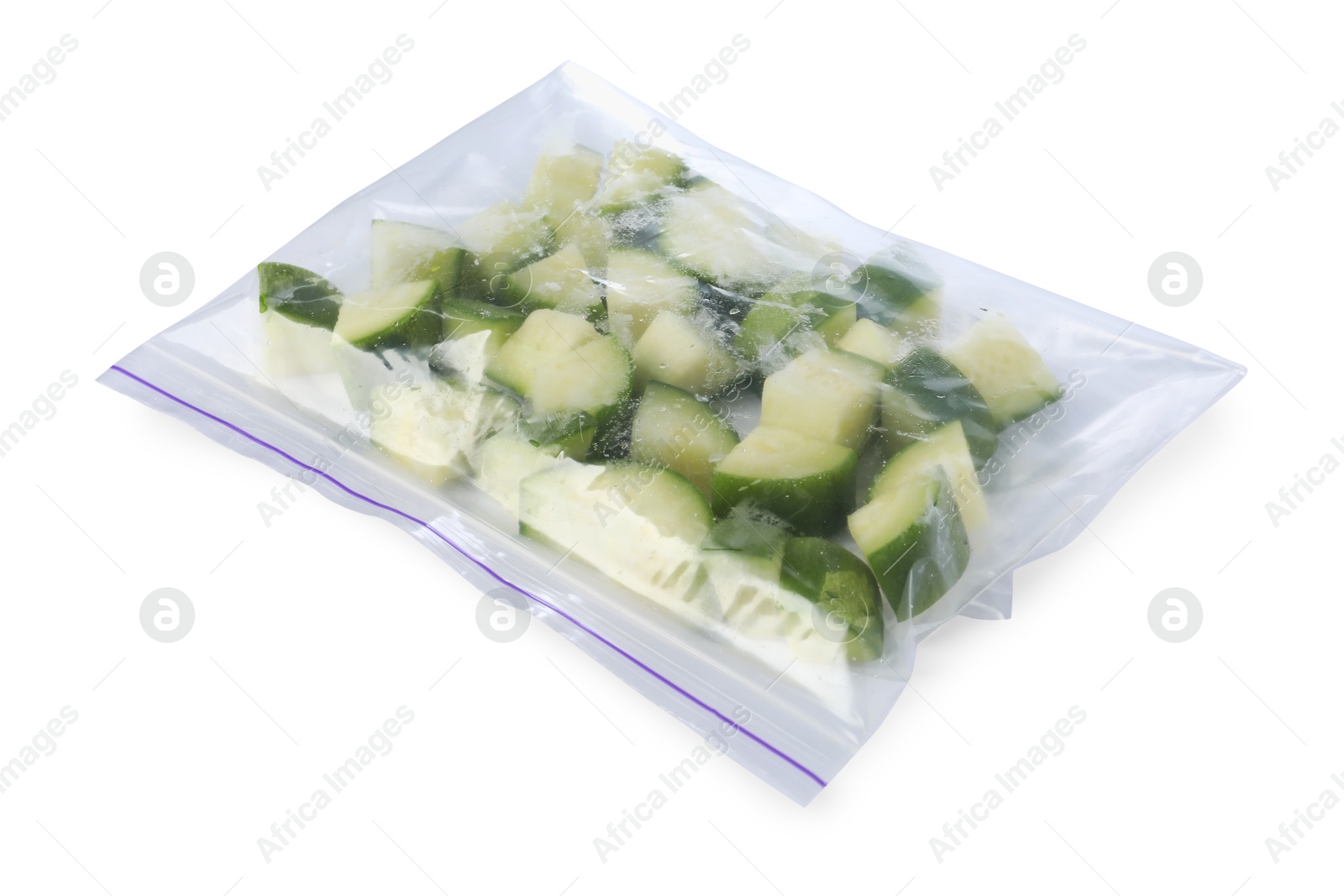 Photo of Frozen chopped zucchini in plastic bag isolated on white