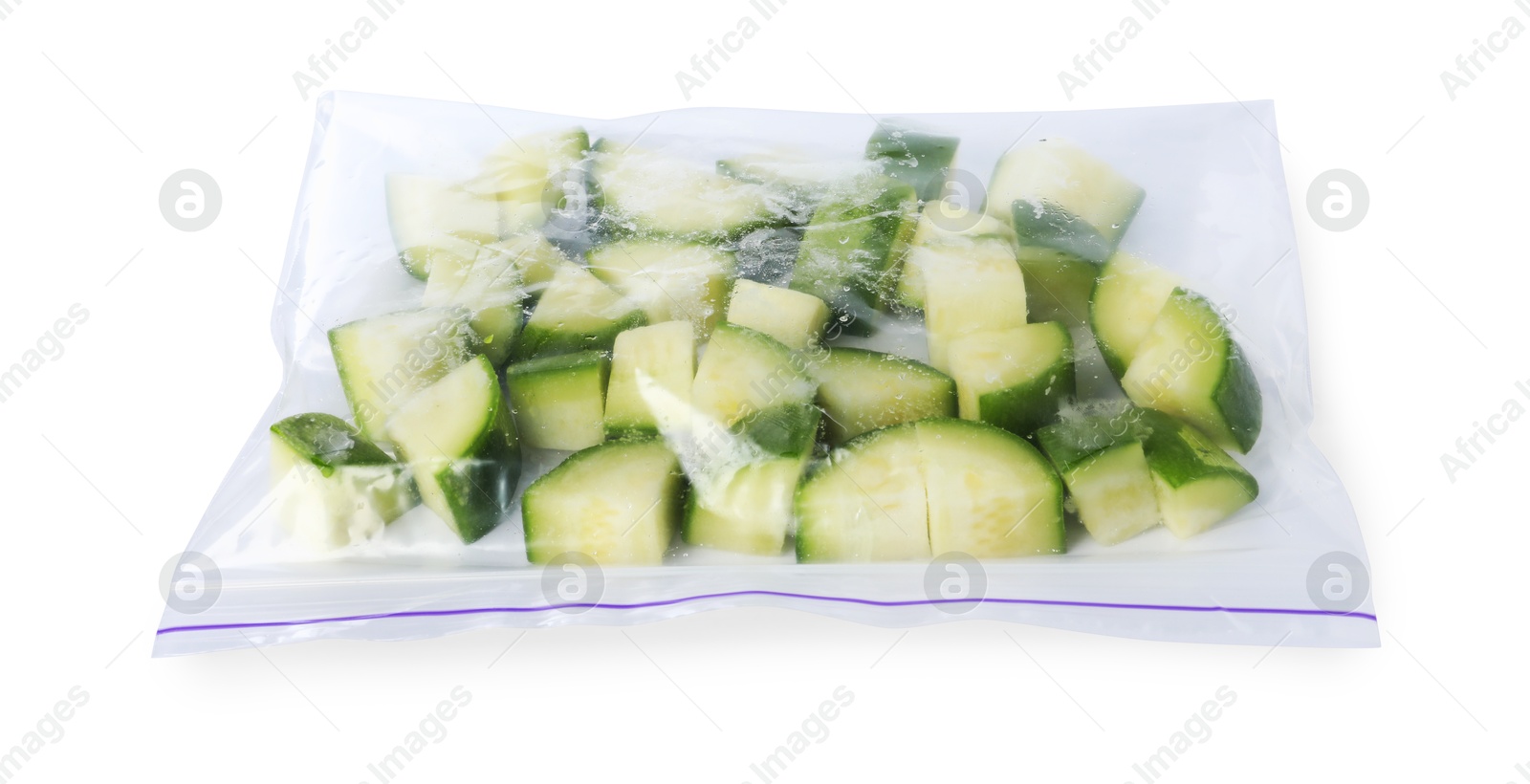 Photo of Frozen chopped zucchini in plastic bag isolated on white