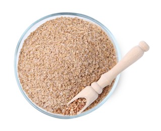 Photo of Buckwheat bran in glass bowl and grains isolated on white, top view