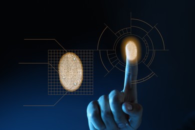 Image of Man scanning fingerprint on virtual screen. Biometric security system