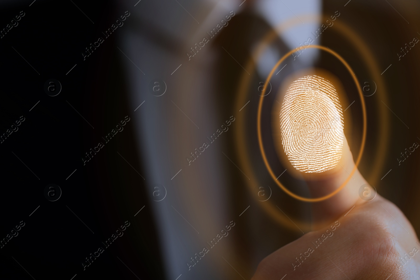 Image of Businessman scanning fingerprint on virtual screen. Biometric security system