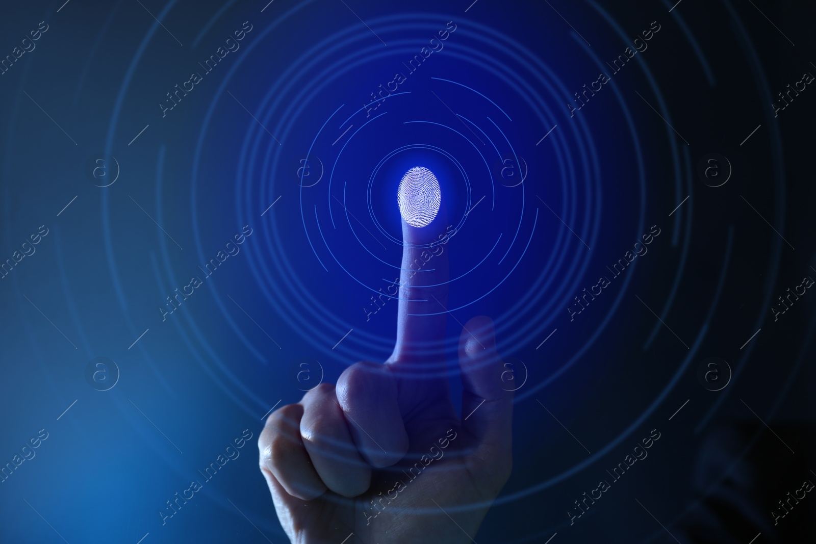 Image of Man scanning fingerprint on virtual screen. Biometric security system