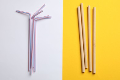 Photo of Different drinking straws on color background, flat lay