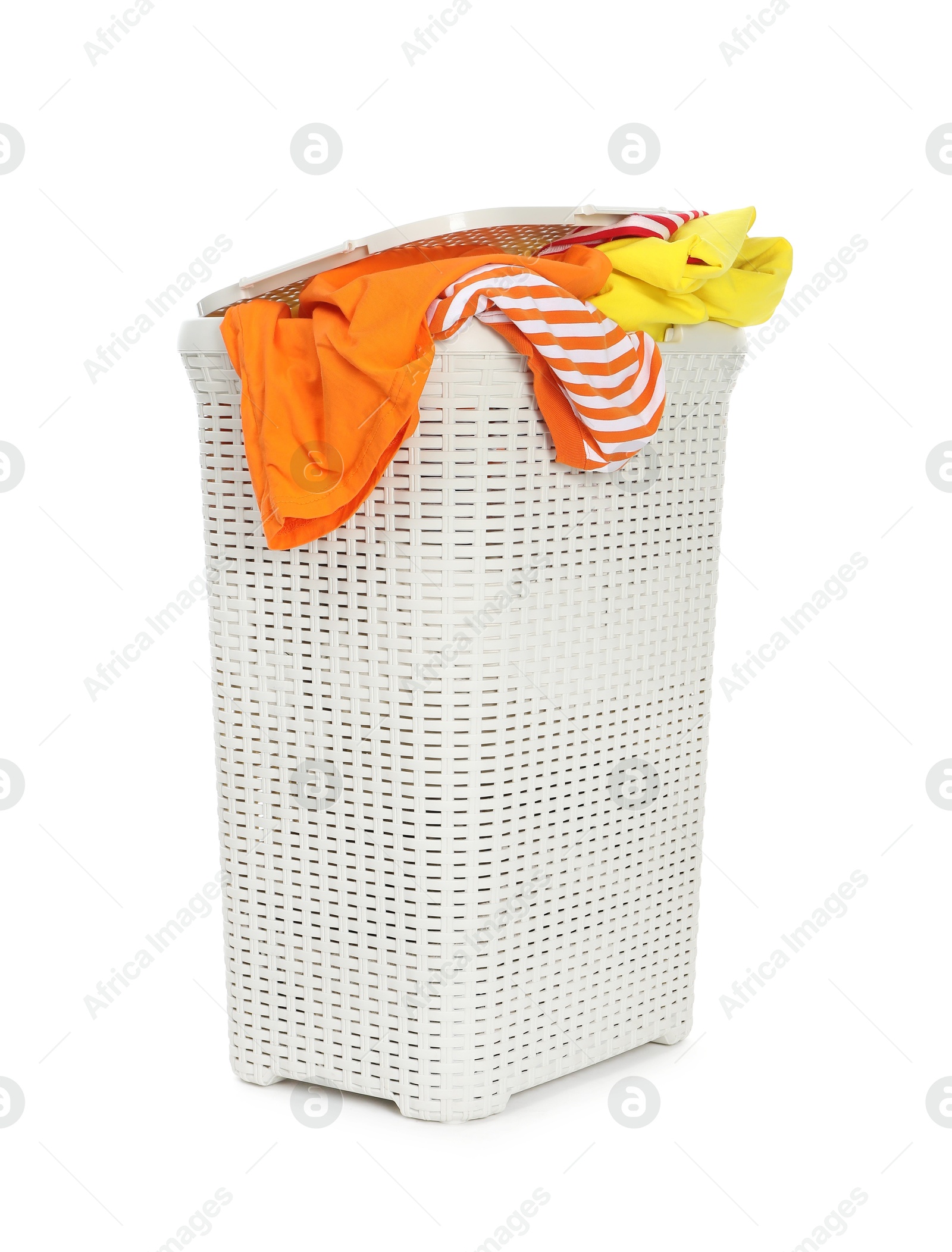 Photo of Wicker basket full of laundry isolated on white