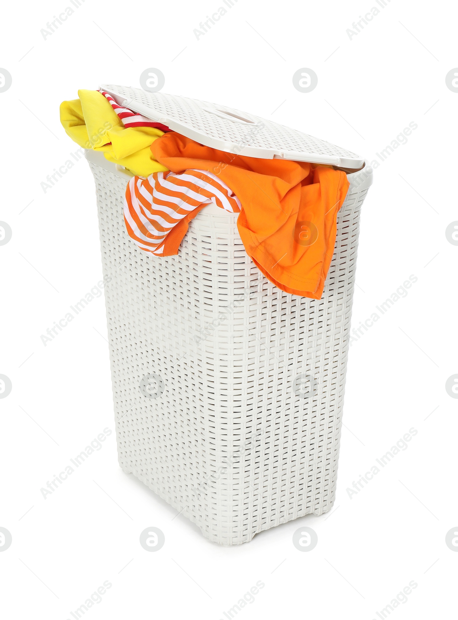 Photo of Wicker basket full of laundry isolated on white