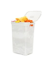 Photo of Wicker basket full of laundry isolated on white