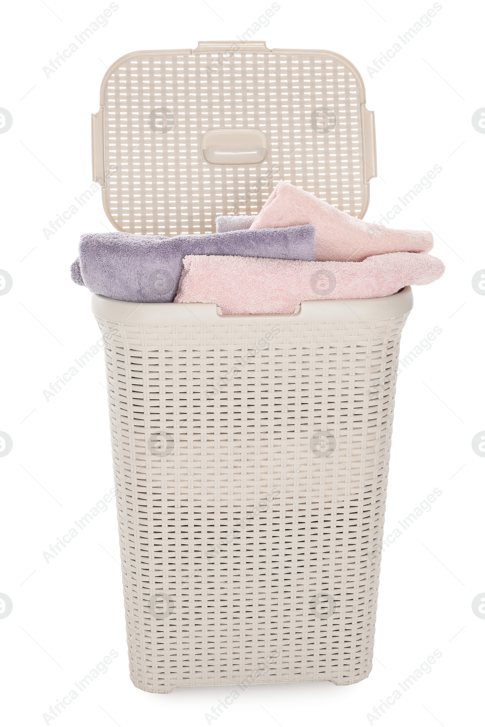 Photo of Wicker basket full of laundry isolated on white