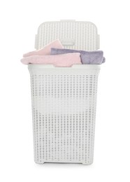 Photo of Wicker basket full of laundry isolated on white