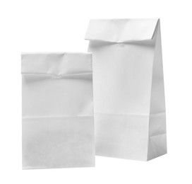 Photo of Two closed paper bags isolated on white