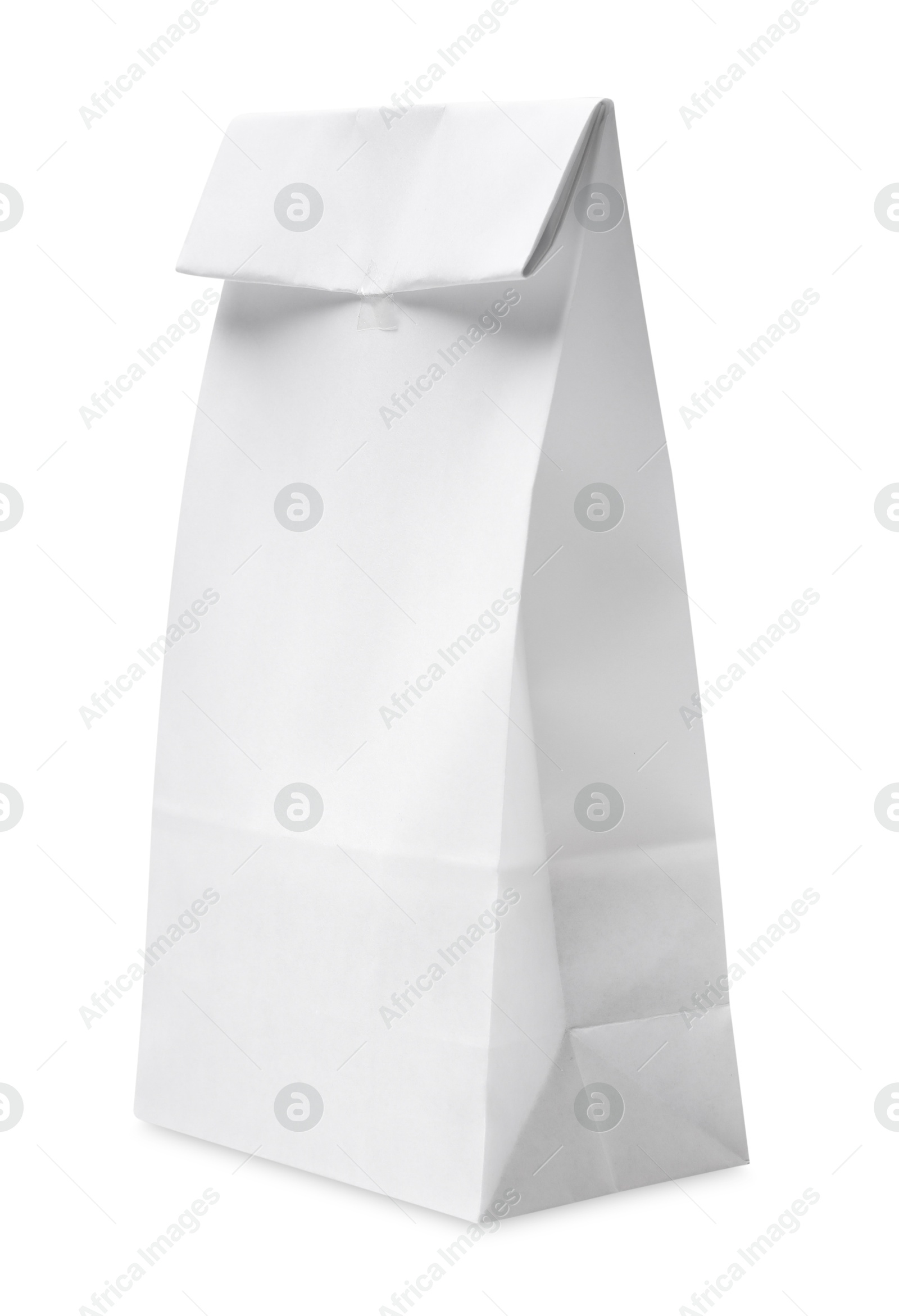 Photo of One closed paper bag isolated on white