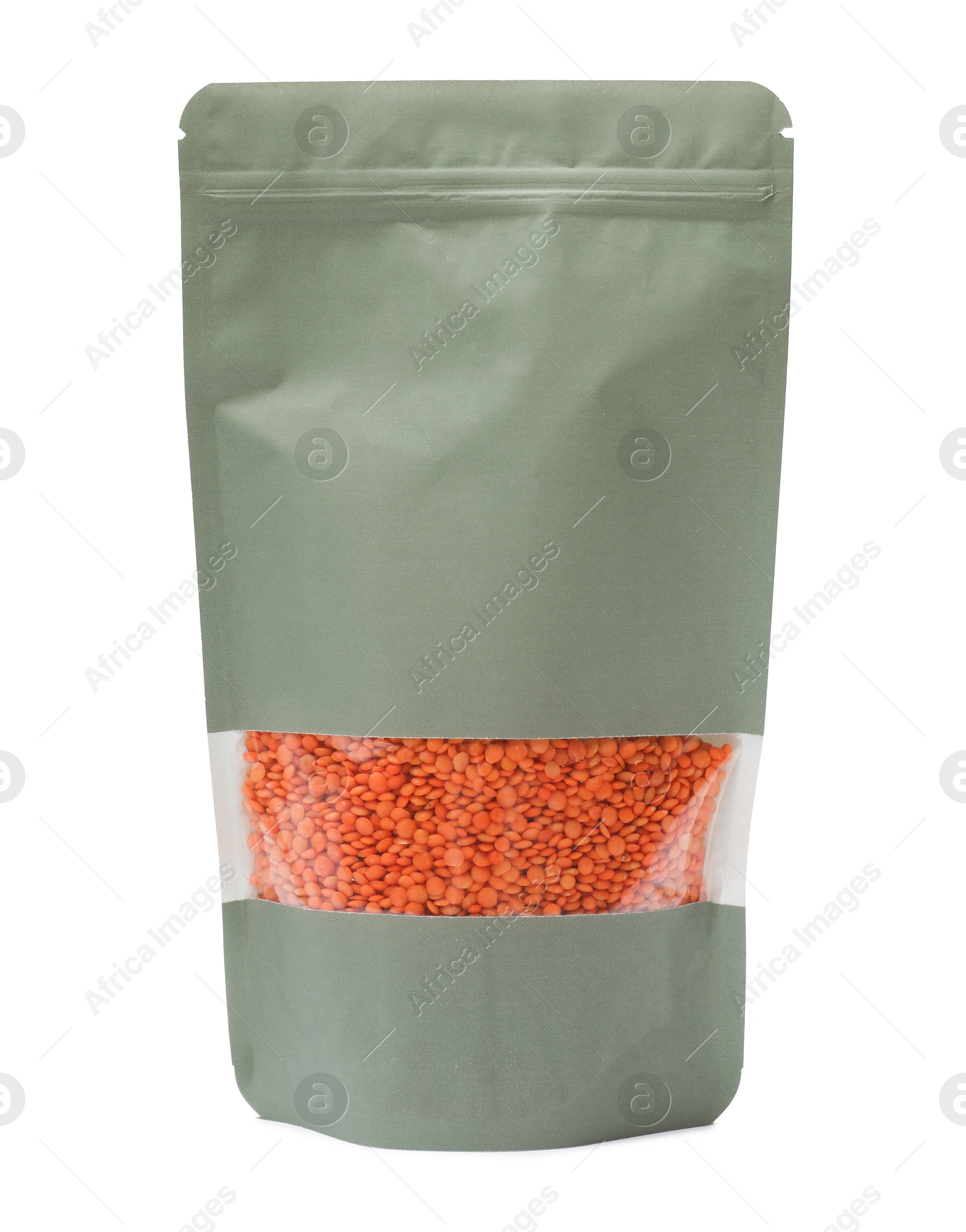 Photo of Paper pouch bag with lentil isolated on white