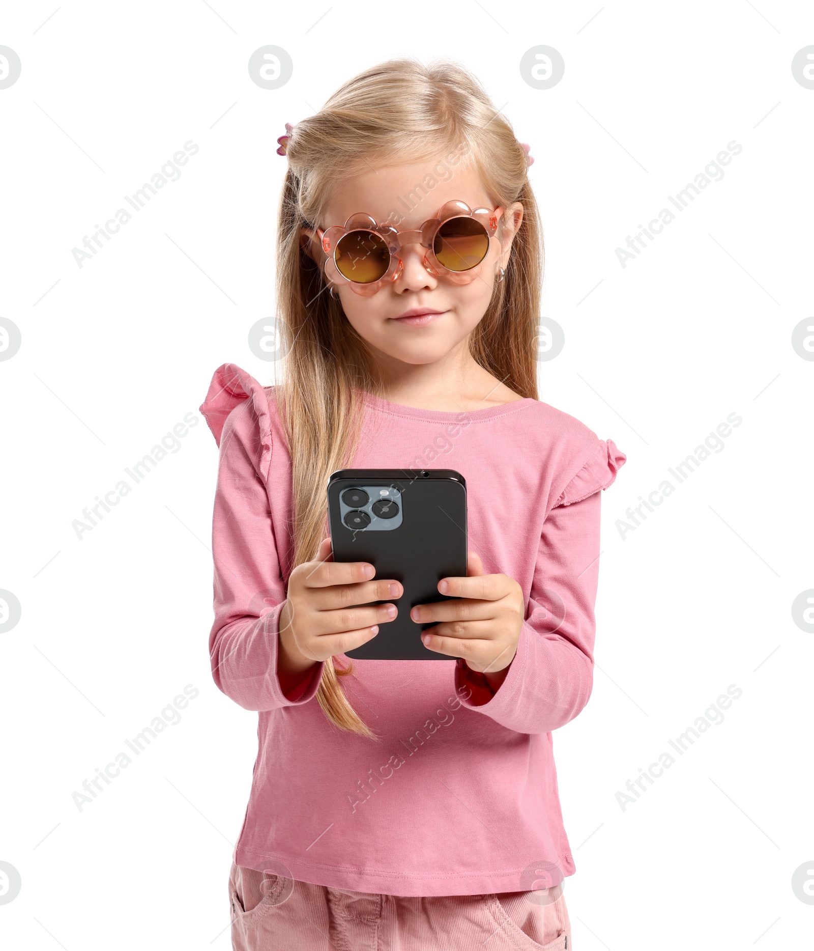 Photo of Cute little girl with smartphone on white background