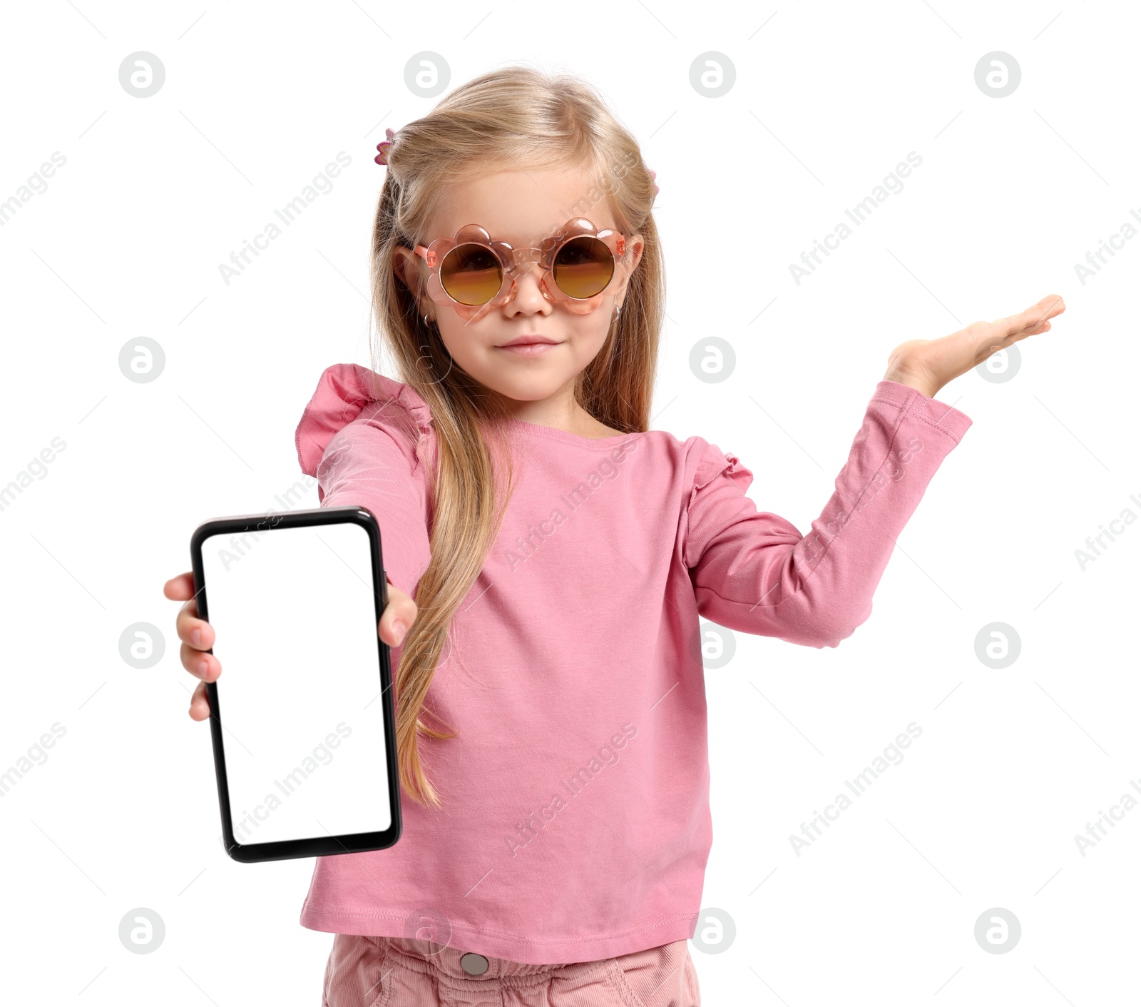 Photo of Cute little girl with smartphone on white background