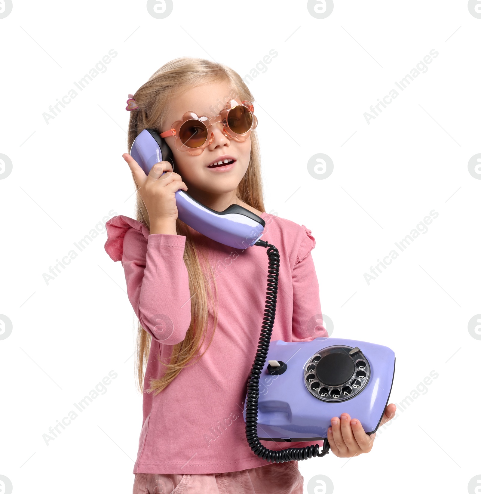 Photo of Cute little girl with telephone on white background