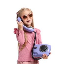 Photo of Cute little girl with telephone on white background