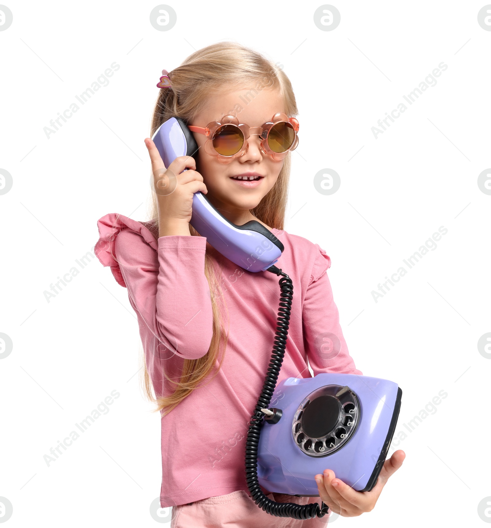 Photo of Cute little girl with telephone on white background