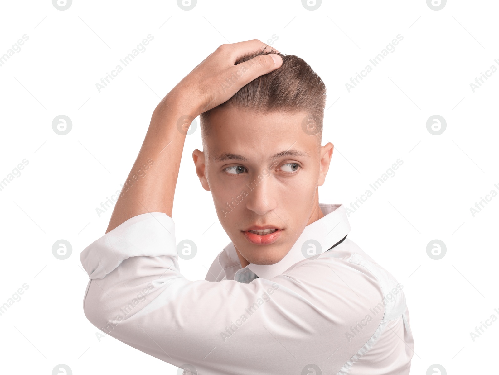 Photo of Confident young man with stylish haircut on white background