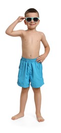 Photo of Cute little boy in beachwear on white background