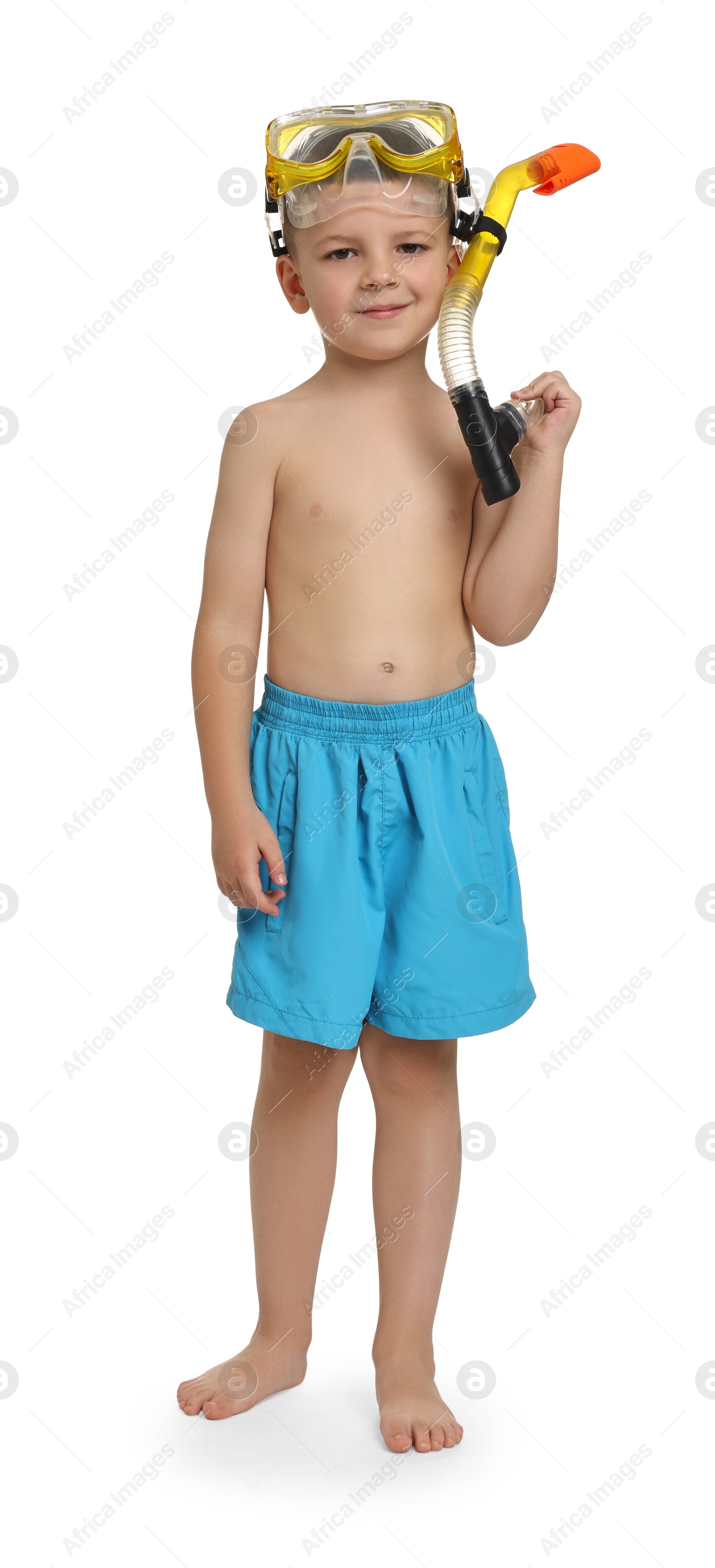 Photo of Cute little boy in beachwear with snorkeling equipment on white background