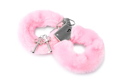 Photo of Pink fluffy handcuffs and keys isolated on white. Sex toy