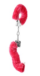 Photo of Bright fluffy handcuffs in air on white background